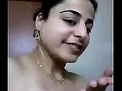 Hot Indian teen indulges in steamy action, sucking and riding with intensity.