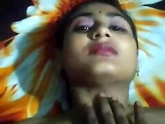Seductive Indian wife Rashmi passionately locks lips with her lover in a hot and romantic encounter.