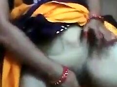 Mature Indian woman finds pleasure in rough sex and oral exploration.