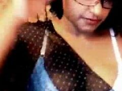 A stunning Desi teenage beauty confidently disrobes, revealing her alluring curves in this recent porn video.