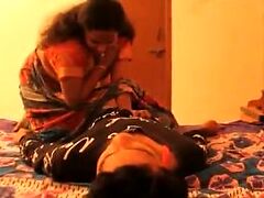 Indian couple gets naughty on the bed in a hot video.
